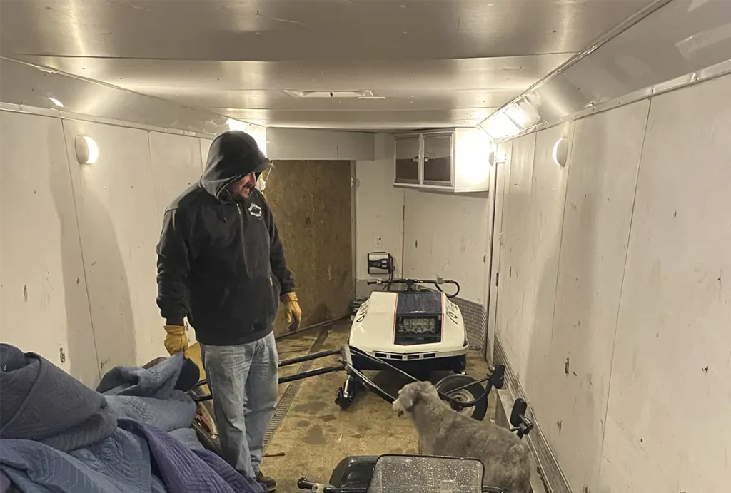 In the trailer, headed home